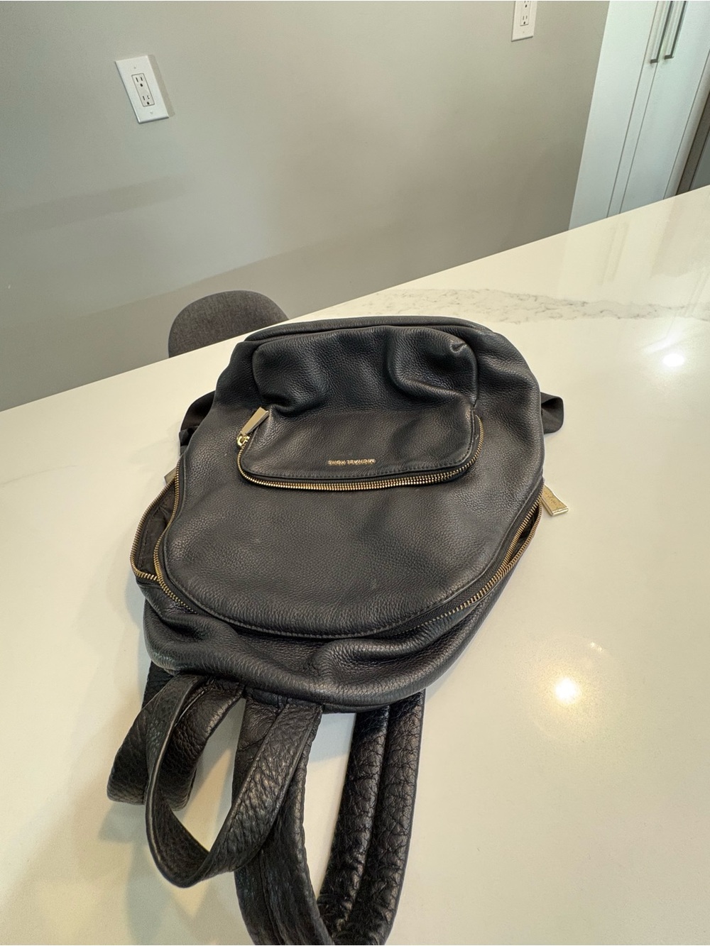 Michael Kors Black Leather Backpack with Gold Hardware - Picture 12 of 15